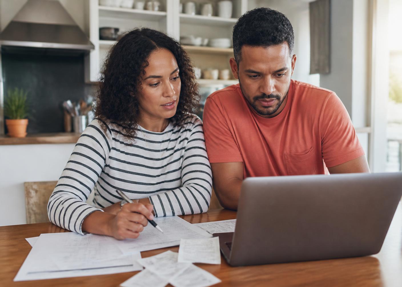 A South African couple reviewing their household budget